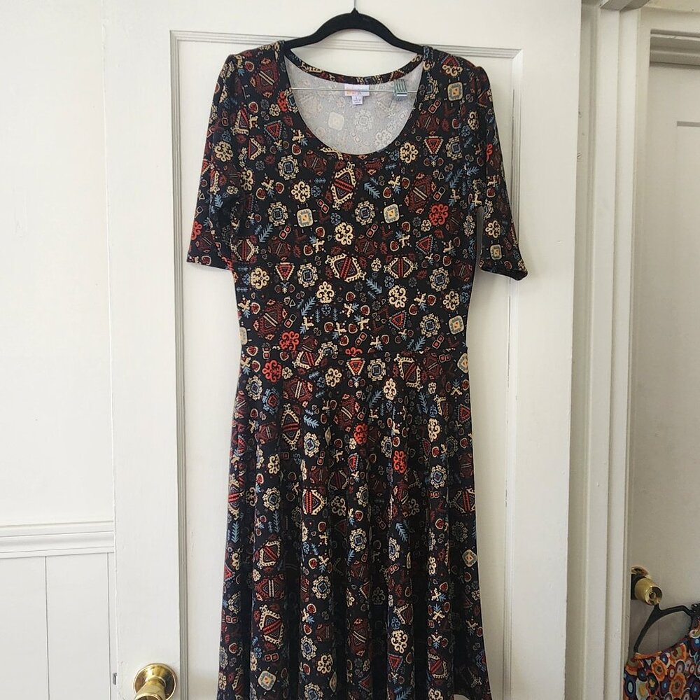 Lula Roe Amelia Dress with a whimsical print